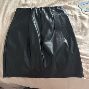 ASOS Black Leather skirt. Tight fit. Slides on and off, no zipper.